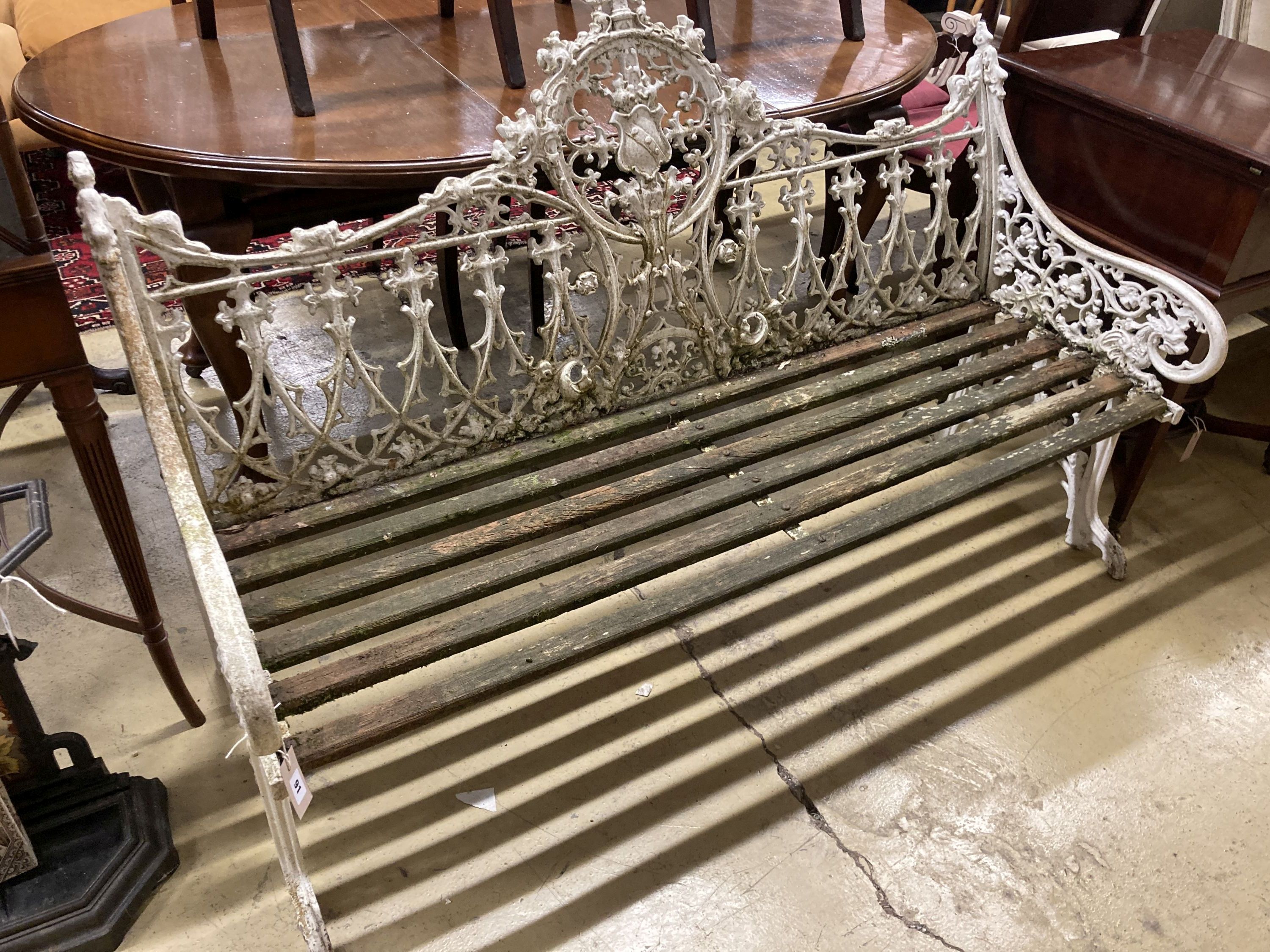 A Victorian style Coalbrookdale design painted cast metal garden bench with slatted wood seat, length 150cm, depth 55cm, height 100cm